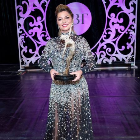 Shania with an award.